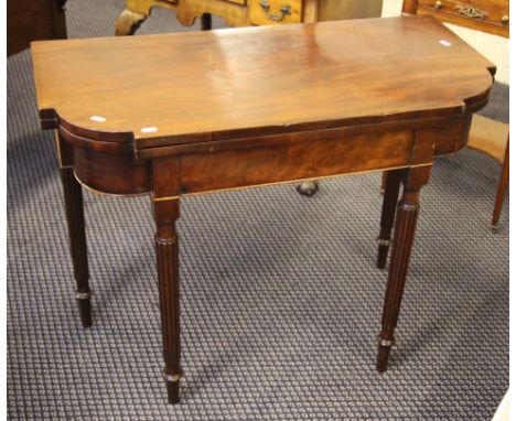 A 19th Century mahogany fold over card table all on four tapered column legs with red fabric top, height 73cm, length 91cm, d