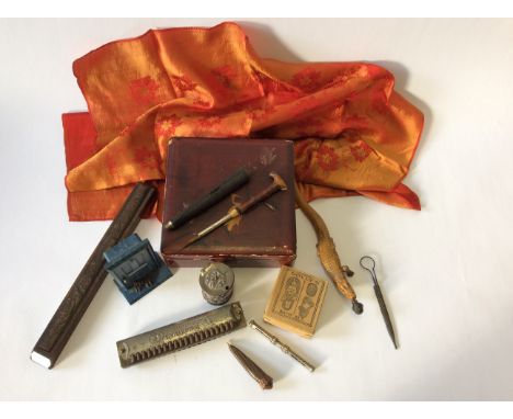 A selection of mixed items to include a blue Bakelite 'Evening in Paris' perfume box in the form of a door, a crocodile penci