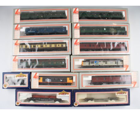 Two boxed Lima OO gauge diesel locomotives, boxed DMU three car unit, five carriages and three boxed Bachmann wagons. (13)