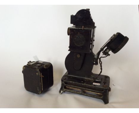 A Pathe-baby cine-camera with projector.