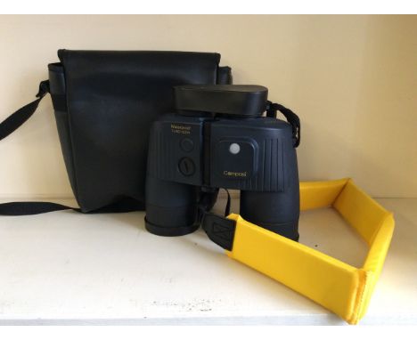 A pair of Binocam binoculars with built in compass, housed in fitted bag.