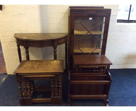 A mahogany single door display cabinet together with a magasine stand, hall table, two nests of tables, a dressing screen fra