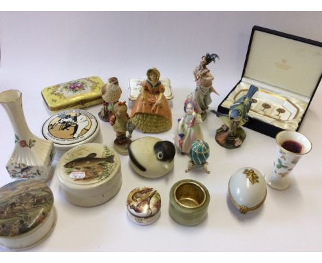 A selection of figurines including Royal Doulton, Goebel with a Halcyon Days dish, pots with lids, a Limoges egg etc.