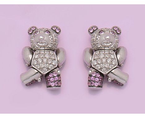 Paar "Bären"-Stick Pins Weißgold, gest. 750. Kleine bewegliche Bärenfiguren, besetzt mit Diamanten und pinkfarbenen Saphiren.