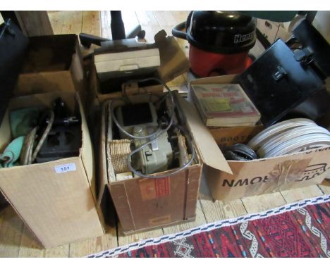 A quantity of vintage cinema projectors and film reels, to include a Specto projector, a Eumig P8 Imperial and a Eumig Mk 610