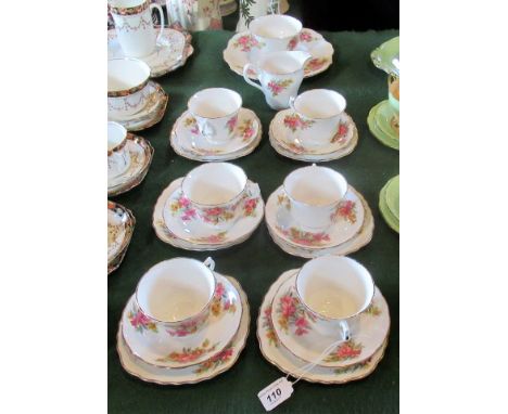 A Vale bone china part-tea service, comprising: six trios, square sandwich plates, open sugar bowl and milk jug, having decor