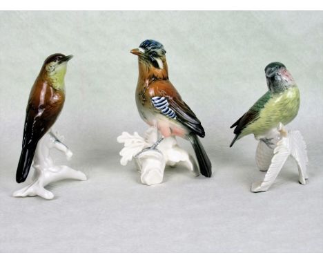 Three Karl Ens bird figurines, to include: a Jay, Fly Catcher and Crossbill, the tallest 16.5cm.   Condition Report:  Small n