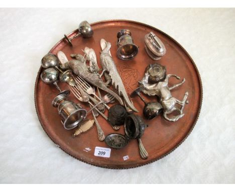 A large circular copper tray, together with a quantity of silver plated items, to include: pheasants, goblets, table top ligh