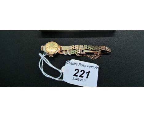 A lady's 9ct gold cased Rotary wristwatch, to a 9ct gold gate link bracelet.