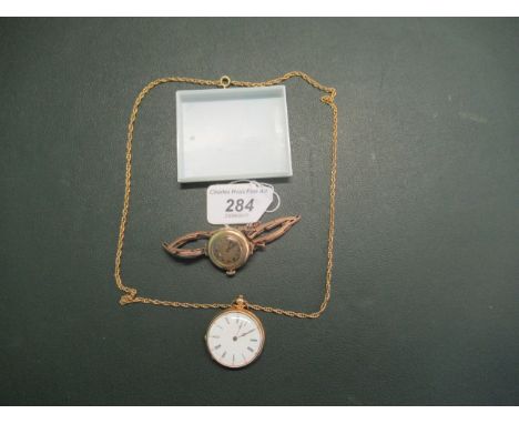 A Swiss yellow and gilt metal cylinder platform open faced watch, having white enamel dial and Roman numerals, on later chain