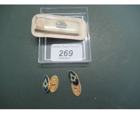 A pair of 9ct gold and enamel Masonic cufflinks, together with a silver engine turned cigar cutter.