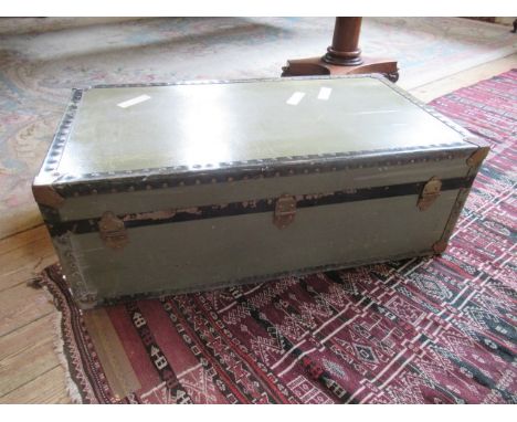 A brass bound steamer trunk, 93cm wide.