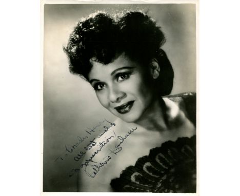DUNHAM KATHERINE: (1909-2006) American dancer and choreographer. Vintage signed and inscribed 8 x 10 photograph of Dunham in 