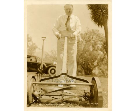 FIELDS W.C.: (1880-1946) American film comedian. Vintage signed sepia 8 x 10 photograph of Fields standing in a full-length p