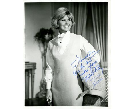 DAY DORIS: (1922-2019) American actress and singer. Signed and inscribed 8 x 10 photograph of Day standing in a three-quarter