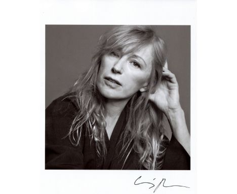 SHERMAN CINDY: (1954- ) American Artist. Best known for her photographic self-portraits. Signed 8 x 10 photograph by Sherman,