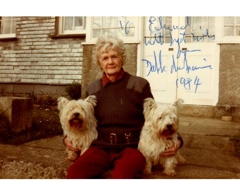 DU MAURIER DAPHNE: (1907-1989) British author. Signed and inscribed colour 5 x 3.5 photograph of Du Maurier seated outdoors i