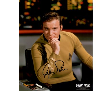 SHATNER WILLIAM: (1931-&nbsp;&nbsp;&nbsp;&nbsp; ) Canadian actor. Signed colour 8 x 10 photograph of Shatner seated in a thre