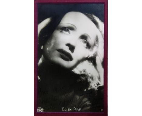 PIAF EDITH: (1915-1963) French singer. Vintage signed and inscribed postcard photograph of Piaf in a head and shoulders pose.