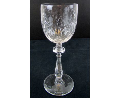 [CAPONE AL]: (1899-1947) American gangster and crime boss during the Prohibition era. A long-stemmed crystal white wine glass