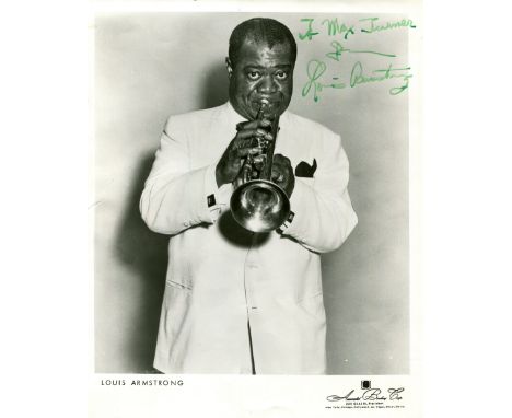 ARMSTRONG LOUIS: (1901-1971) American jazz trumpeter. Vintage signed and inscribed 8 x 10 photograph of Armstrong standing in