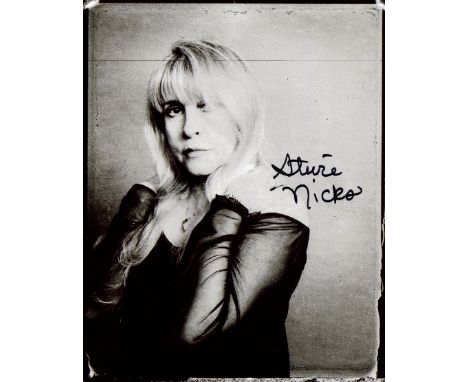 NICKS STEVIE: (1948- ) American Singer and Songwriter, known for her work with the band Fleetwood Mac. The band´s album Rumou