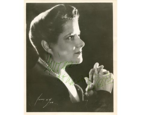 NOVAES GUIOMAR: (1895-1979) Brazilian pianist. Vintage signed 8 x 10 photograph of Novaes in a semi-profile head and shoulder