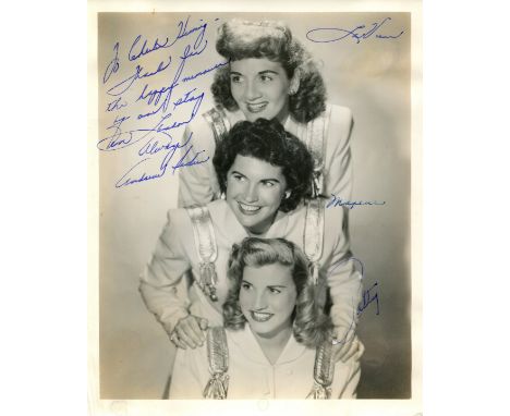 ANDREWS SISTERS THE: A good vintage signed and inscribed 8 x 10 photograph by all three members of the American close harmony