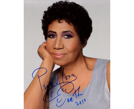 GREAT FEMALE SINGERS: A good small selection of three signed 8 x 10 photographs, comprising ARETHA FRANKLIN (1942-2018) Ameri