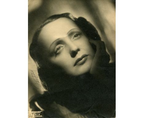 PIAF EDITH: (1915-1963) French singer. Vintage signed sepia 7 x 9.5 photograph of Piaf in a close-up head and shoulders pose 