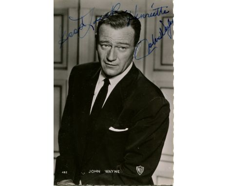 WAYNE JOHN: (1907-1979) American actor, Academy Award winner. A good vintage signed and inscribed postcard photograph of Wayn
