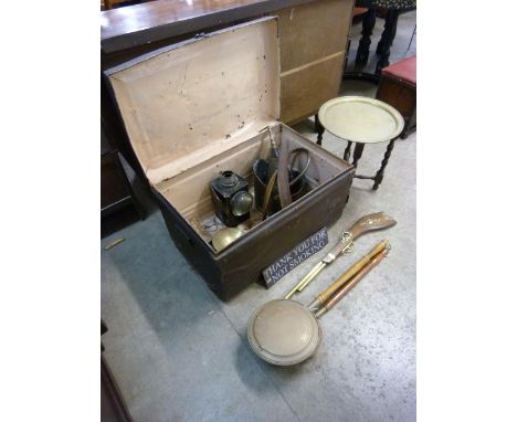A tin trunk and contents, including; warming pans, metalware, etc. 