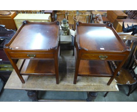 A pair of George III style mahogany lamp tables 