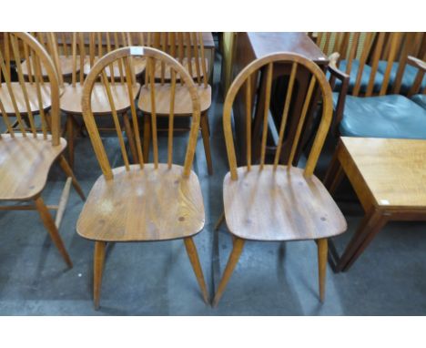 A pair of Ercol Blonde elm and beech Windsor chairs 