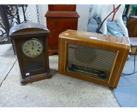 A walnut radio and a German oak mantle clock 