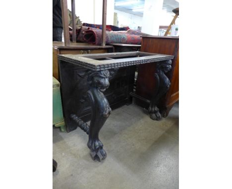 A 17th Century style carved oak console table base 