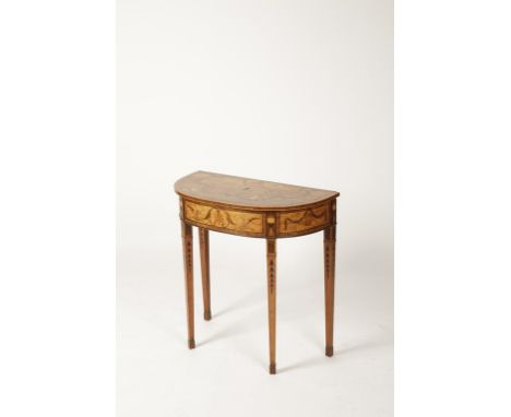 A DUTCH MARQUETRY FOLD-TOP SIDE TABLE, the "D"-shaped top with a central fan motif surrounded by swagged foliage and vase-sha