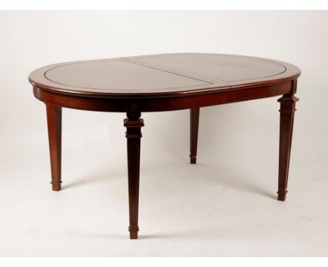 A REGENCY STYLE MAHOGANY BRASS STRUNG DINING ROOM SUITE, the dining table with rounded ends and two removable leaves, with a 