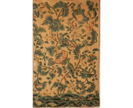 A CREWEL WORK PANEL worked with stylised flowering trees above a landscape with a stag being pursued by a hound, possibly Eli