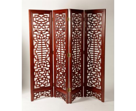 A CHINESE HARDWOOD FOUR FOLD SCREEN with moulded fret work panels within rectangular frames, each panel 72" x 20". See illust