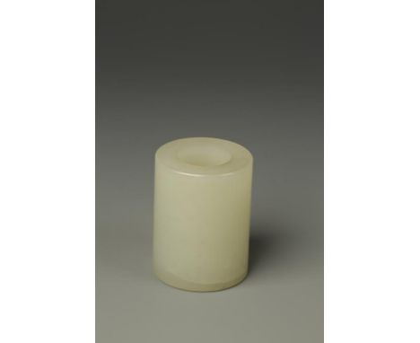 A CHINESE PALE CELADON JADE CYLINDRICAL VESSEL, 20th century, 1.75" high