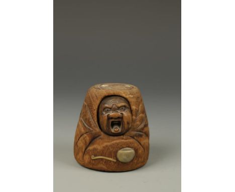 A JAPANESE ELM TOBACCO CASE, with a mask netsuke front, Meiji, 3.75" high 