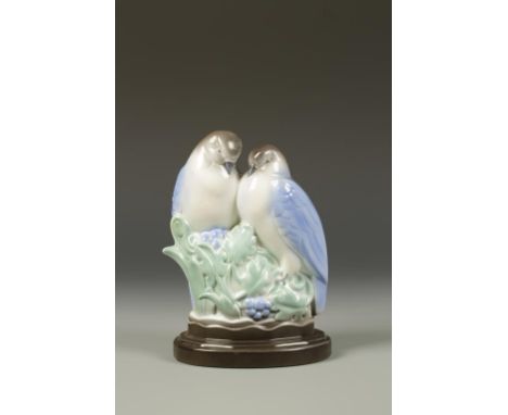 A POOLE POTTERY ORNAMENT "LOVE BIRDS" by Harry Brown, impressed and incised marks, circa 1930's, 8" high. See illustration