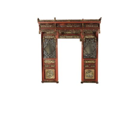 A LARGE CHINESE PARCEL-GILT CARVED WOOD BED SURROUND, stepped top with elaborate giltwood figure carvings, above mirrored sid