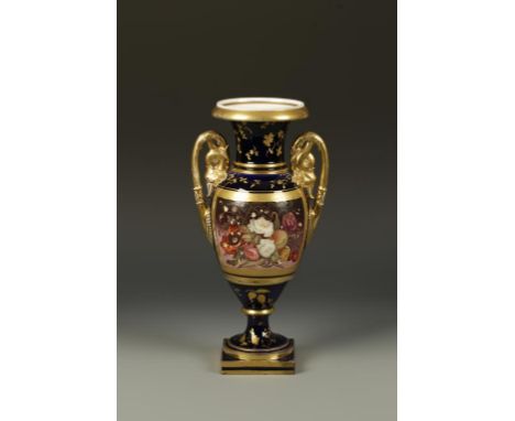 AN ENGLISH PORCELAIN URN-SHAPED VASE with a panel of painted flowers and fruit, within a gilt cartouche and floral sprays, on