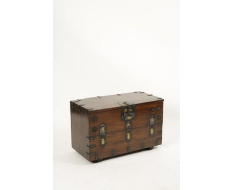 A KOREAN ELM TRUNK, the rectangular top with upturned ends, with a fall front and all over metal mounts, early to mid 20th ce