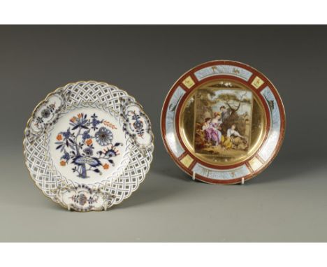 A VIENNA PORCELAIN PLATE with a transfer printed scene of children playing, within a gilt border and panels of gilt bird and 