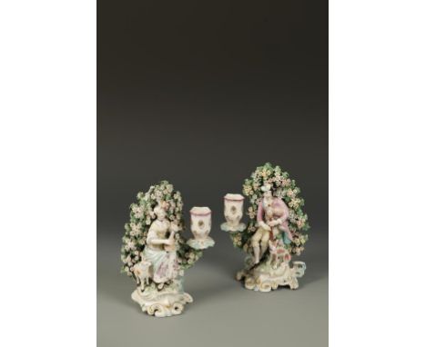 A PAIR OF DERBY FIGURE CANDLESTICKS with single branches beside a man and woman playing musical instruments with a dog and la