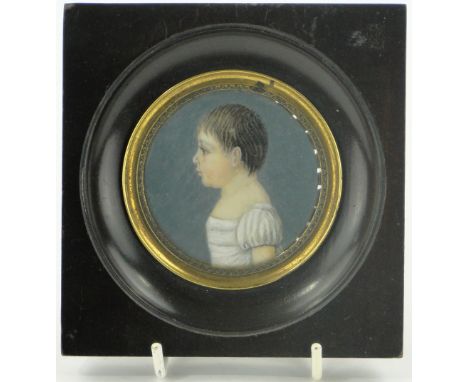 18/19th century miniature watercolour on ivory, portrait of a child, unsigned, 2.5" across, framed.