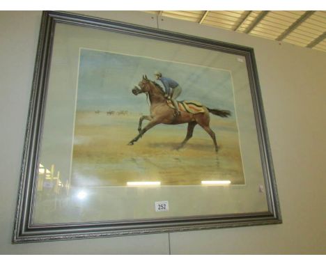 A framed and glazed limited edition print 'Red Rum' signed S L Crawford